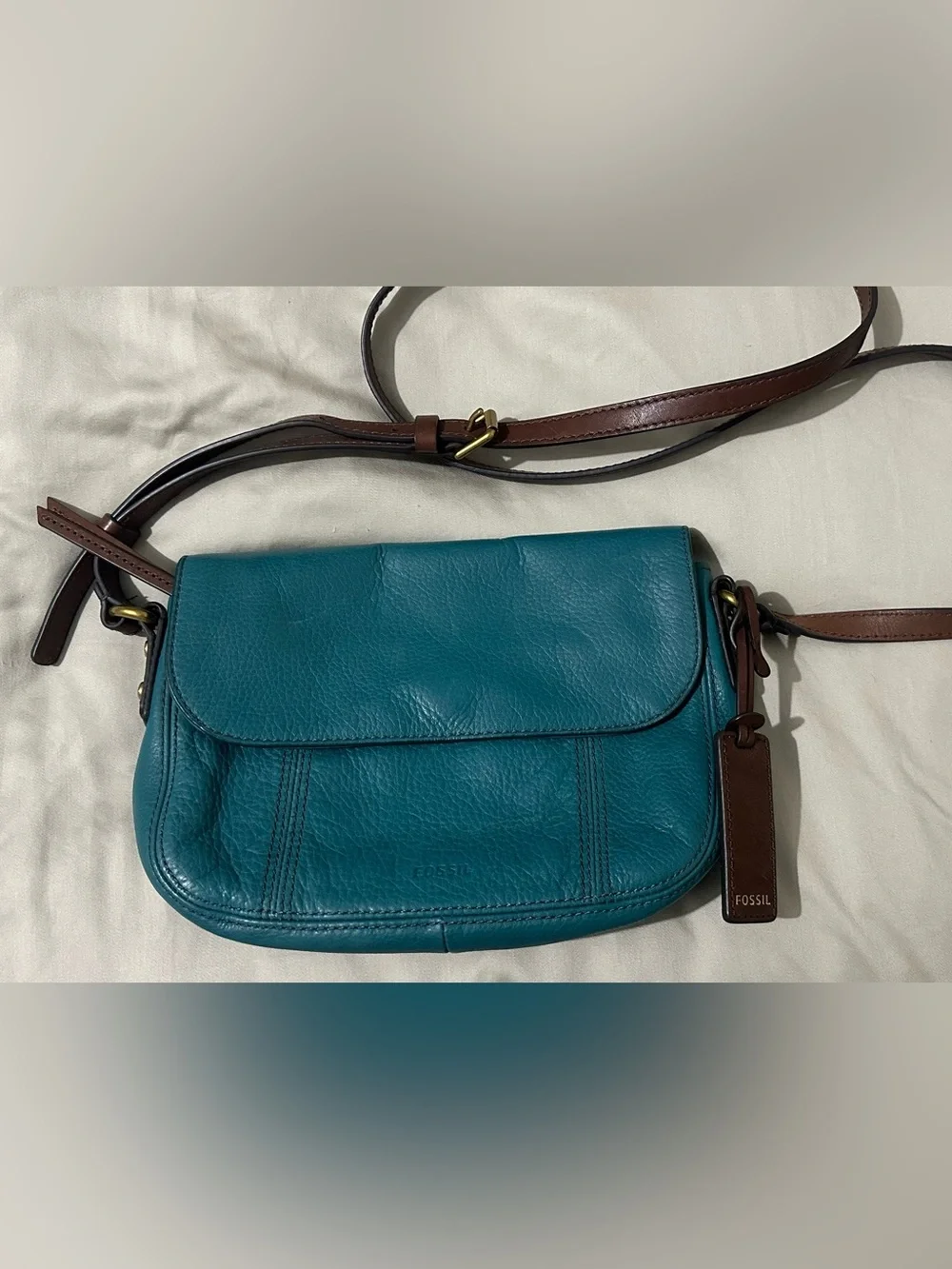 Fossil teal pebbled leather flap crossbody bag
